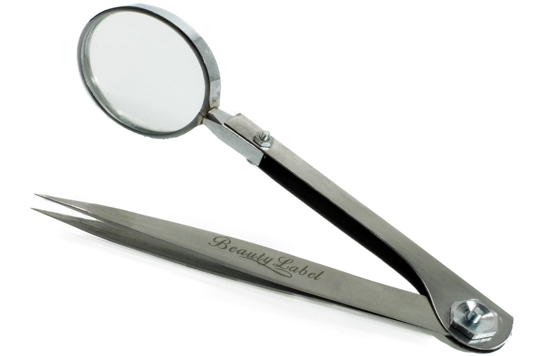 Pincet met vergrootglas en scherpe punt